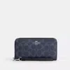 Coach Outlet Long Zip Around Wallet In Signature Canvas In Black