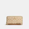 Coach Outlet Long Zip Around Wallet In Signature Canvas In Brown