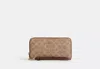 Coach Outlet Long Zip Around Wallet In Signature Canvas In Brown