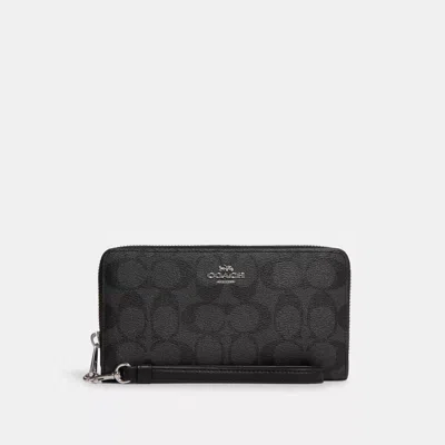 Coach Outlet Long Zip Around Wallet In Signature Canvas In Brown