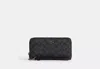 Coach Outlet Long Zip Around Wallet In Signature Canvas In Multi