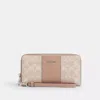 Coach Outlet Long Zip Around Wallet In Signature Canvas With Stripe In Multi