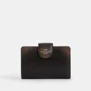 Coach Outlet Medium Corner Zip Wallet In Loved Leather In Pattern