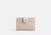 Coach Outlet Medium Corner Zip Wallet In Signature Canvas In Beige