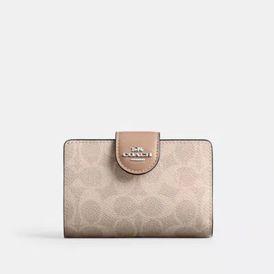 COACH OUTLET MEDIUM CORNER ZIP WALLET IN SIGNATURE CANVAS