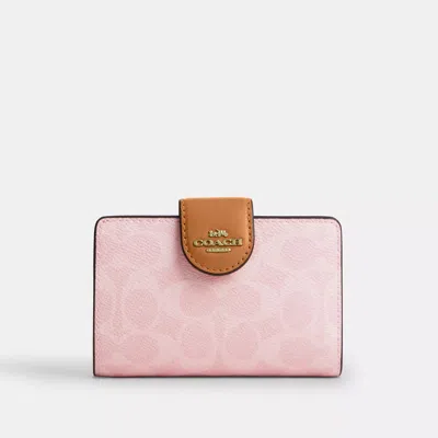 Coach Outlet Medium Corner Zip Wallet In Signature Canvas In Pink