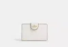 Coach Outlet Medium Corner Zip Wallet In Signature Canvas In White