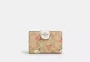 Coach Outlet Medium Corner Zip Wallet In Signature Canvas With Floral Print In Gold/light Khaki Chalk Multi