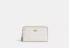 Coach Outlet Medium Id Zip Wallet In Signature Canvas In White