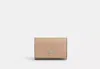 Coach Outlet Micro Wallet In Signature Canvas In Beige