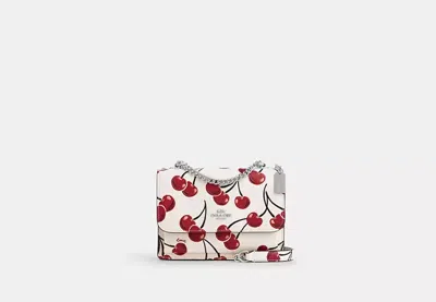 Coach Outlet Mini Klare Crossbody Bag With Cherry Print In White/multi