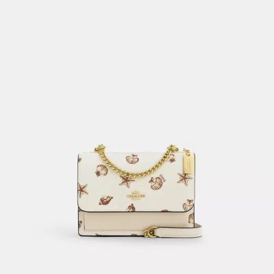 Coach Outlet Mini Klare Crossbody Bag With Shell Print In White