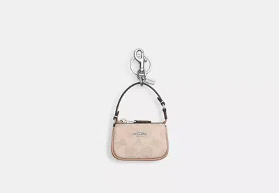Coach Outlet Mini Nolita Bag Charm In Signature Canvas In Beige