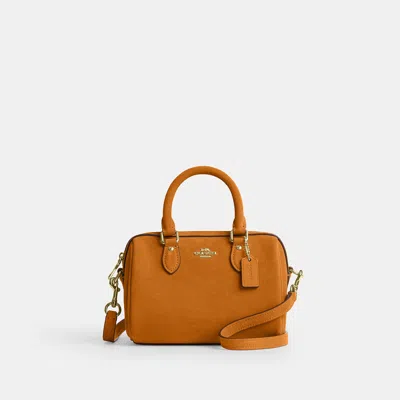 Coach Outlet Mini Rowan Crossbody Bag In Gold/marigold