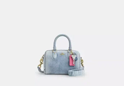 Coach Outlet Mini Rowan Crossbody Bag In Loved Denim With Charms In Blue