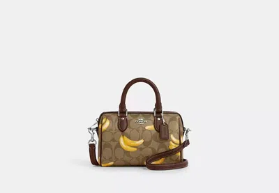 Coach Outlet Mini Rowan Crossbody In Signature Canvas With Banana Print In Brown