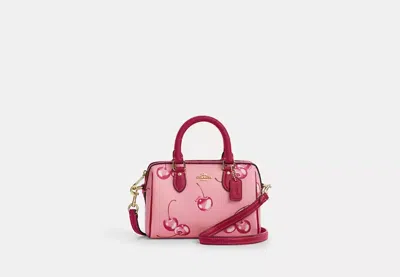 Coach Outlet Mini Rowan Crossbody With Cherry Print In Pink