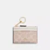 Coach Outlet Mini Skinny Id Case In Signature Canvas In Beige