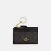 Shop Coach Outlet Mini Skinny Id Case In Signature Canvas In Multi