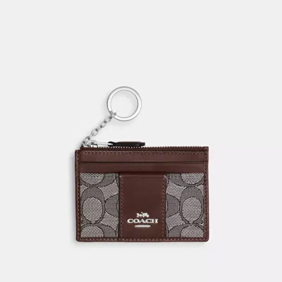 Coach Outlet Mini Skinny Id Case In Signature Jacquard In Brown