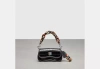 COACH OUTLET MINI WAVY DINKY WITH CROSSBODY STRAP IN CROC EMBOSSED COACHTOPIA LEATHER
