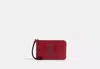 Coach Outlet New Year Corner Zip Wristlet With Snake Graphic In Red