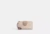 Coach Outlet Phone Wallet In Signature Canvas In Beige
