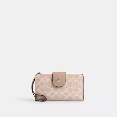 Coach Outlet Phone Wallet In Signature Canvas In Beige