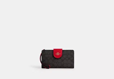 Coach Outlet Phone Wallet In Signature Canvas In Brown