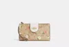Coach Outlet Phone Wallet In Signature Canvas With Floral Print In Multi