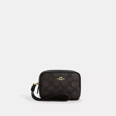 Coach Outlet Pouch Wristlet In Signature Canvas In Multi