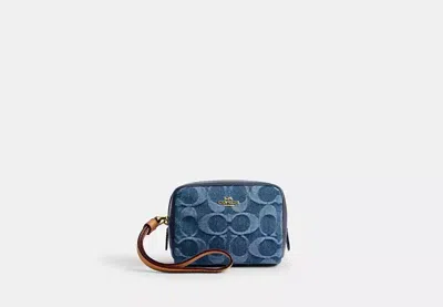Coach Outlet Pouch Wristlet In Signature Denim In Blue