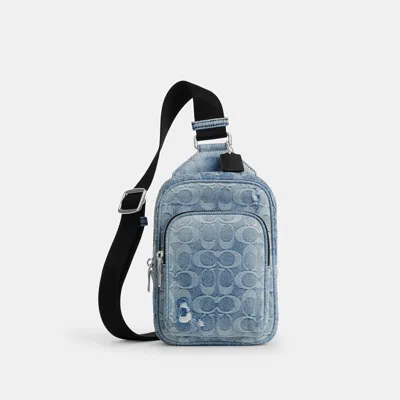 Coach Outlet Racer Sling Pack In Loved Signature Denim In Silver/light Indigo