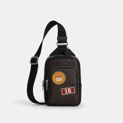 Coach Outlet Racer Sling Pack In Signature Canvas With Patches In Brown