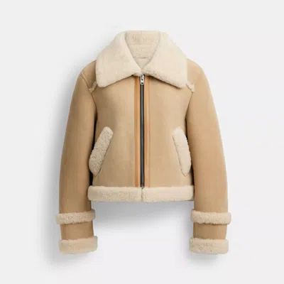 COACH OUTLET SHORT SHEARLING JACKET