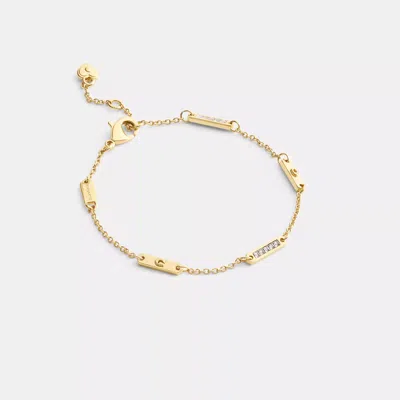 Coach Outlet Signature Bar Chain Linear Bracelet In Gold