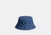 Coach Outlet Signature Denim Bucket Hat In Blue