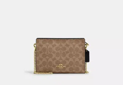 Coach Outlet Slim Crossbody Bag In Signature Canvas In Beige