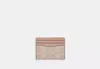 Coach Outlet Slim Id Card Case In Signature Canvas In Beige
