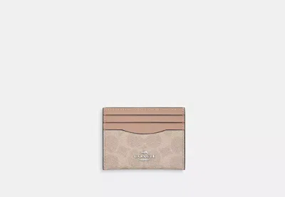 Coach Outlet Slim Id Card Case In Signature Canvas In Beige