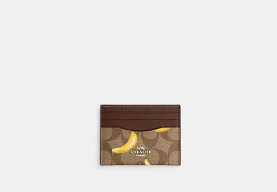 Coach Outlet Slim Id Card Case In Signature Canvas With Banana Print In Brown