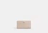 Coach Outlet Slim Zip Wallet In Signature Canvas In Beige
