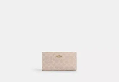 Coach Outlet Slim Zip Wallet In Signature Canvas In Beige