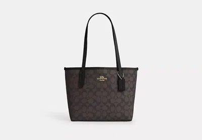 Coach Outlet Small City Tote Bag In Signature Canvas In Beige