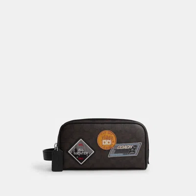 Coach Outlet Small Travel Kit In Signature Canvas With Patches In Brown