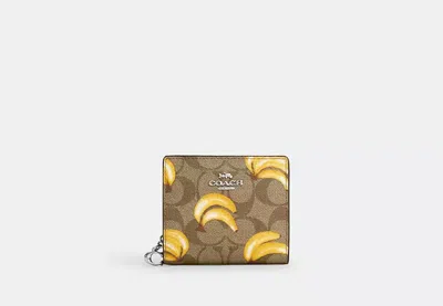 Coach Outlet Snap Wallet In Signature Canvas With Banana Print In Brown