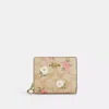 COACH OUTLET SNAP WALLET IN SIGNATURE CANVAS WITH FLORAL PRINT