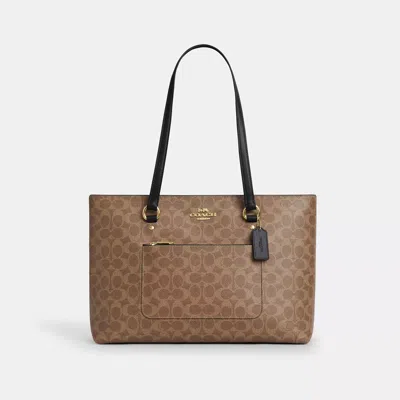 Coach Outlet Station Tote Bag In Signature Canvas In Sand