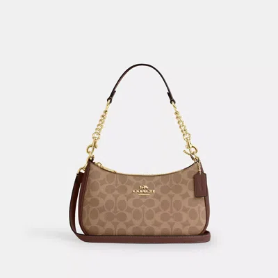 Coach Outlet Teri Shoulder Bag In Signature Canvas In Sand