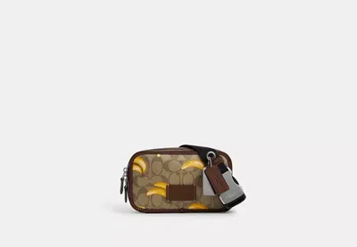 Coach Outlet Wyatt Belt Bag In Signature Canvas With Banana Print In Brown